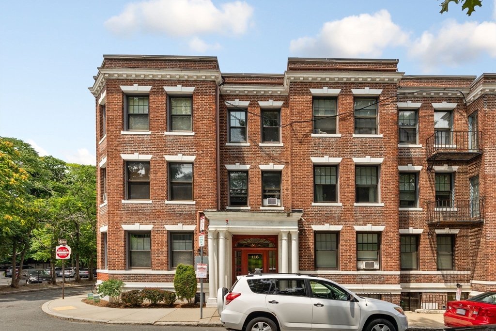 116 Sutherland Road, Unit 1A Boston, MA 02135 - Photo 2 of 21 a front view of multi story residential apartment building
