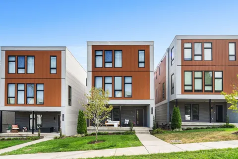 a view of building with yard