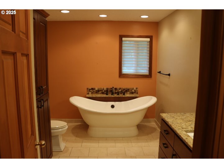 6503 Kinns Road Northeast Woodburn, OR 97071 - Photo 12 of 45 a bathroom with a sink and a mirror
