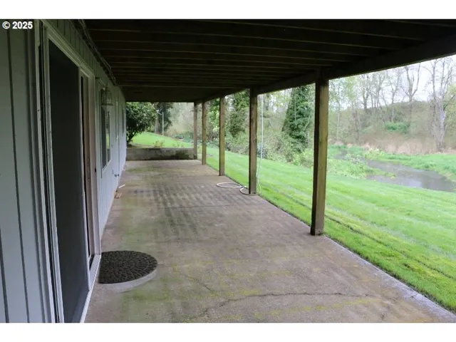 a view of a backyard from a porch