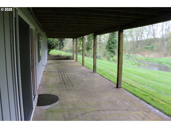 6503 Kinns Road Northeast Woodburn, OR 97071 - Photo 38 of 45 a view of a backyard from a porch