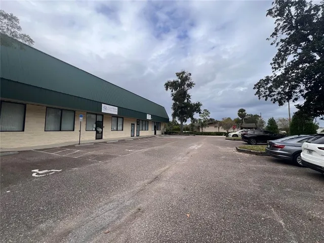 a view of street with parked cars