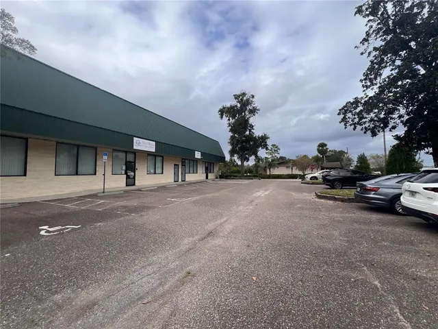 a view of street with parked cars