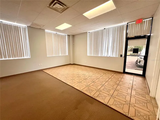 a view of an empty room and window
