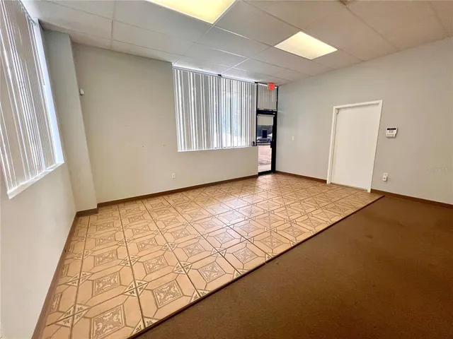 an empty room with windows