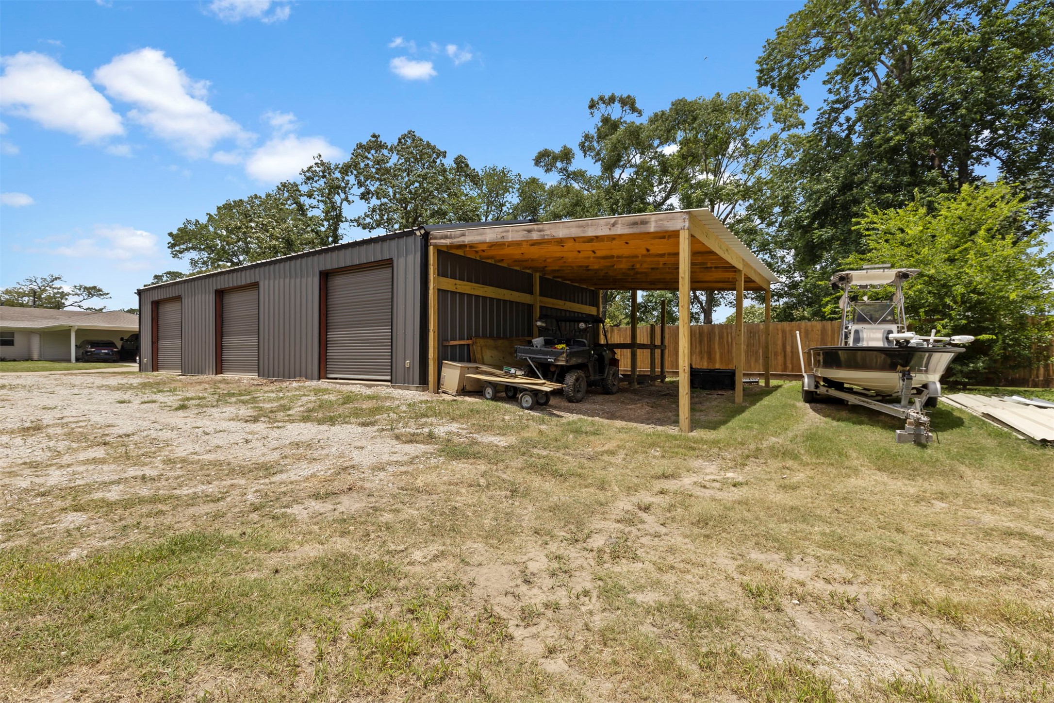 18022 Rogers Road New Waverly, TX 77358 - Photo 39 of 49 Back View of Shop