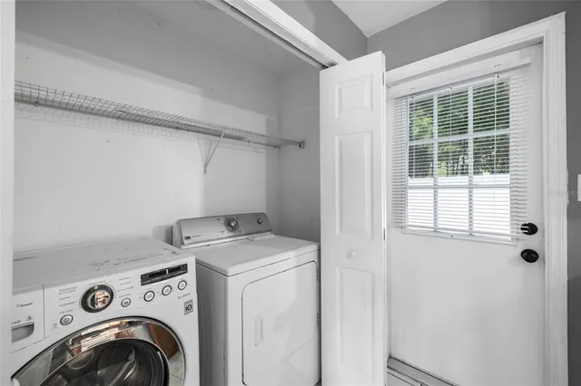a utility room with dryer and washer