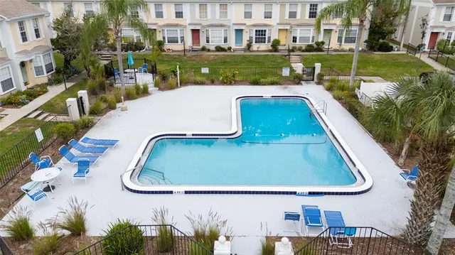 a view of swimming pool from a balcony