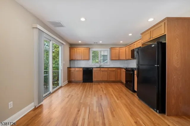 a large kitchen with a large window
