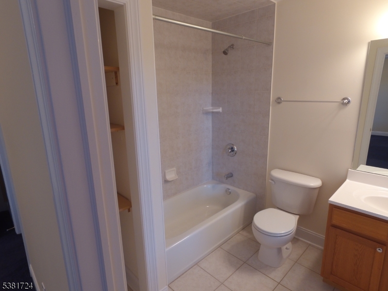 737 Jerusalem Road, Unit 2 Scotch Plains, NJ 07076 - Photo 24 of 32 a bathroom with a toilet and a bathtub