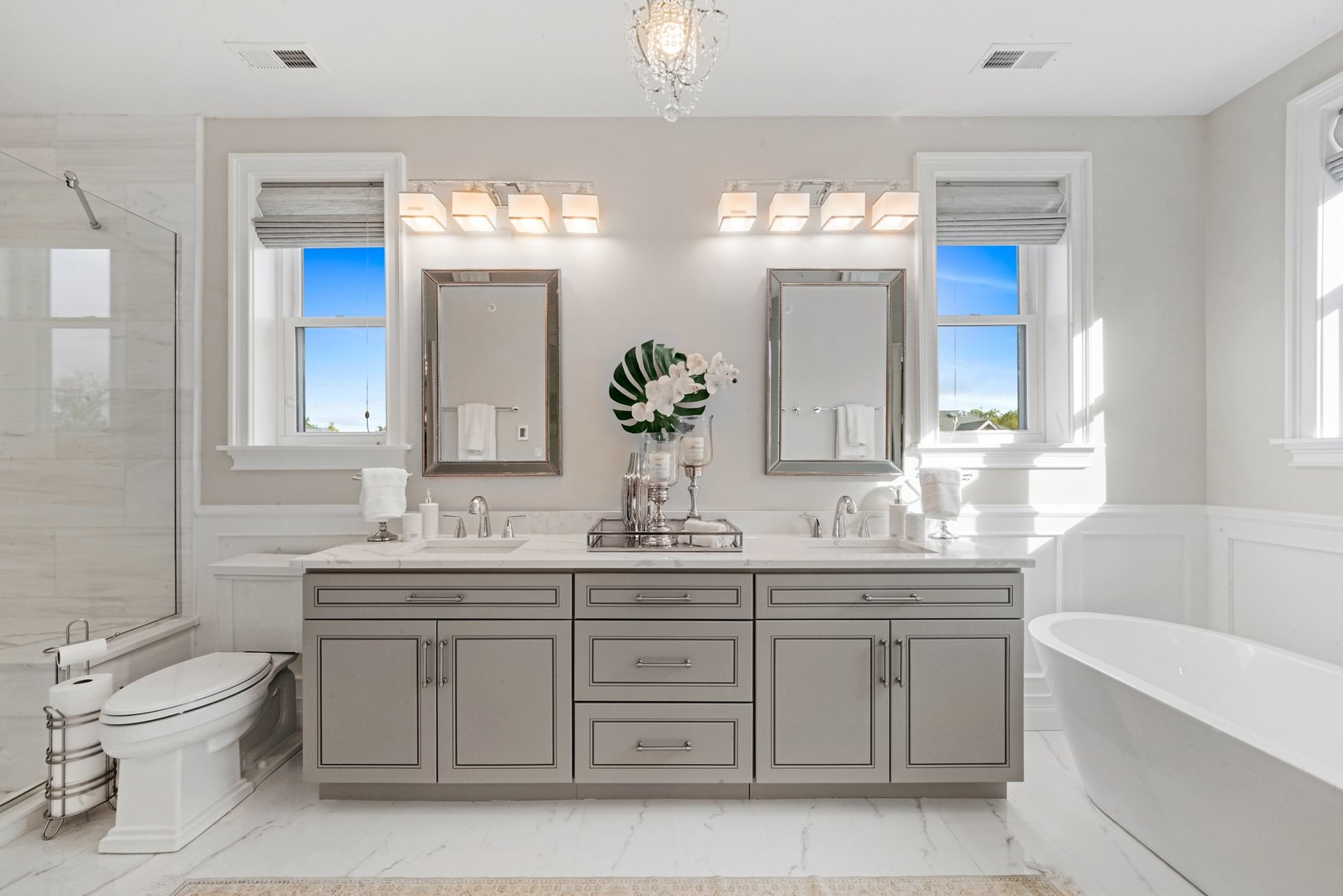 329 South Delphia Avenue Park Ridge, IL 60068 - Photo 14 of 25 a bathroom with a granite countertop sink a toilet and a mirror