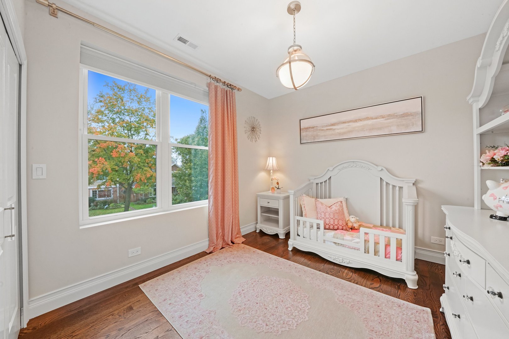 329 South Delphia Avenue Park Ridge, IL 60068 - Photo 19 of 25 a bedroom with furniture and a window