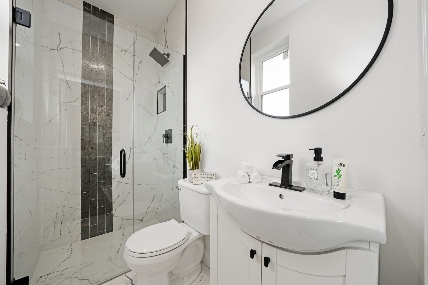 329 South Delphia Avenue Park Ridge, IL 60068 - Photo 21 of 25 a bathroom with a sink a toilet and a mirror