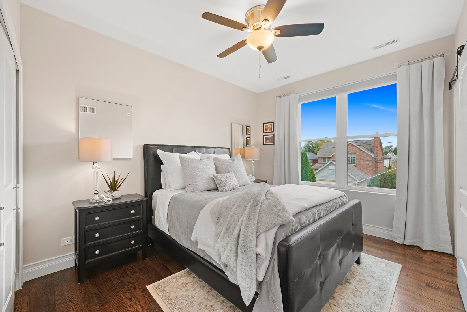 329 South Delphia Avenue Park Ridge, IL 60068 - Photo 22 of 25 a bedroom with a bed and a large window