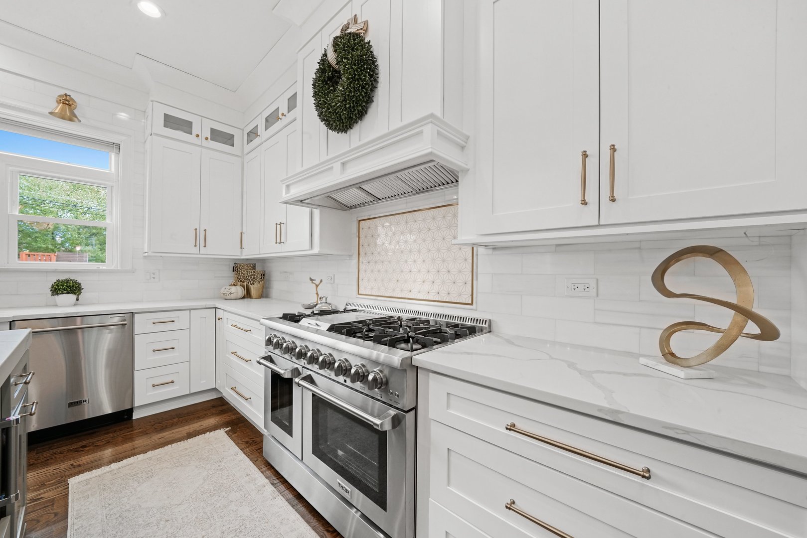 329 South Delphia Avenue Park Ridge, IL 60068 - Photo 7 of 25 a kitchen with granite countertop a stove and a sink