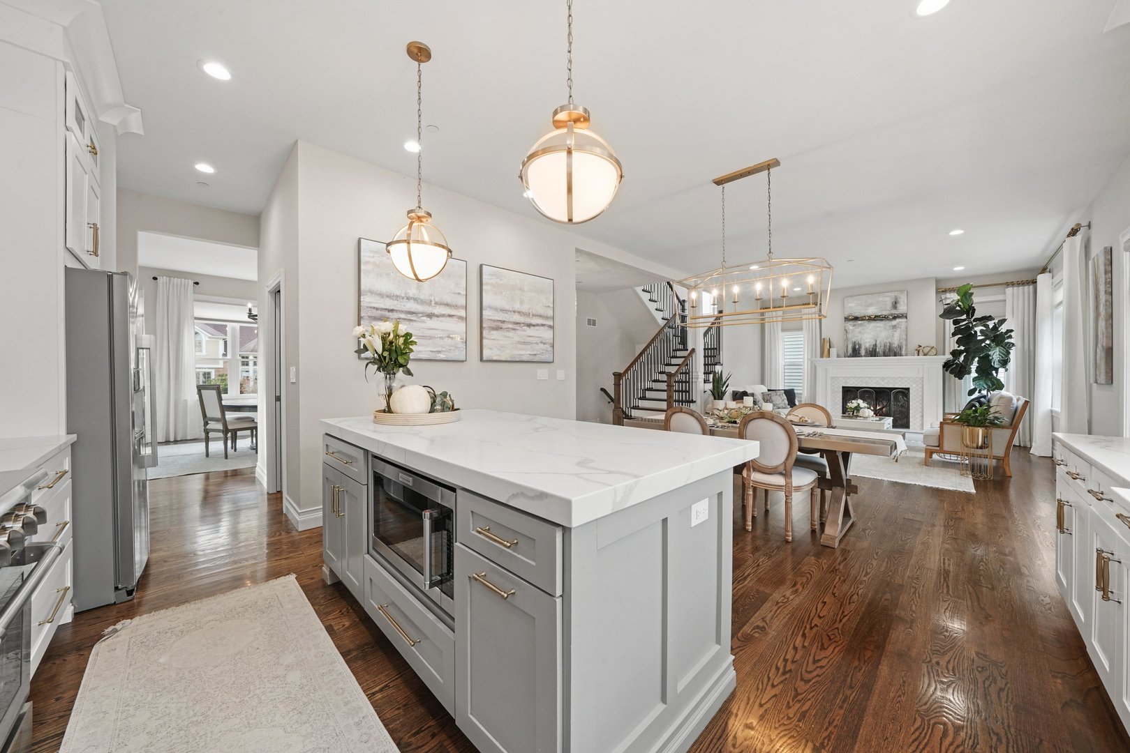 329 South Delphia Avenue Park Ridge, IL 60068 - Photo 10 of 25 a large kitchen with stainless steel appliances kitchen island a large island in the center