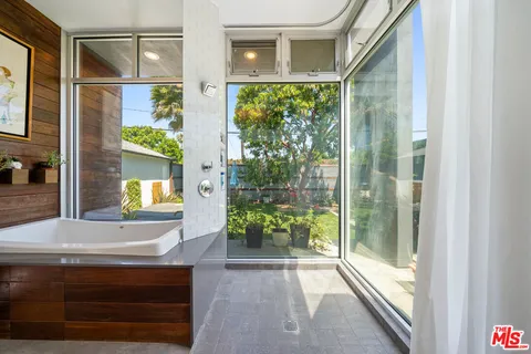 a house view with a garden space