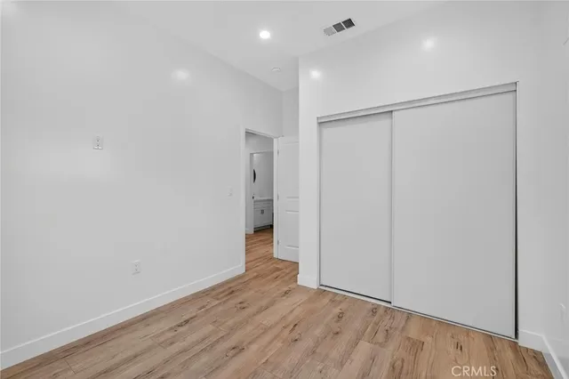 a view of livingroom with washer and dryer