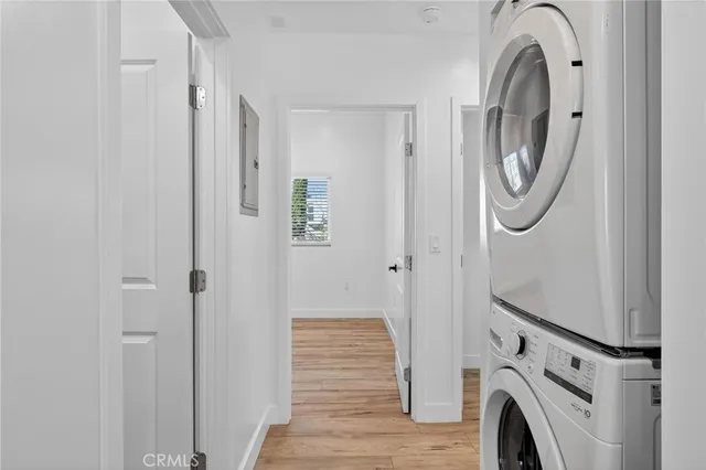 a kitchen with stainless steel appliances a refrigerator sink and cabinets