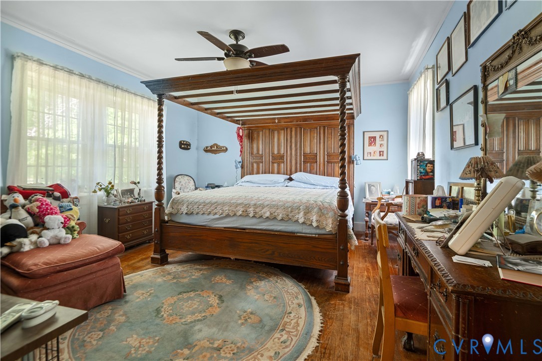 6243 Studley Road Mechanicsville, VA 23116 - Photo 20 of 65 a bedroom with a bed and wooden floor