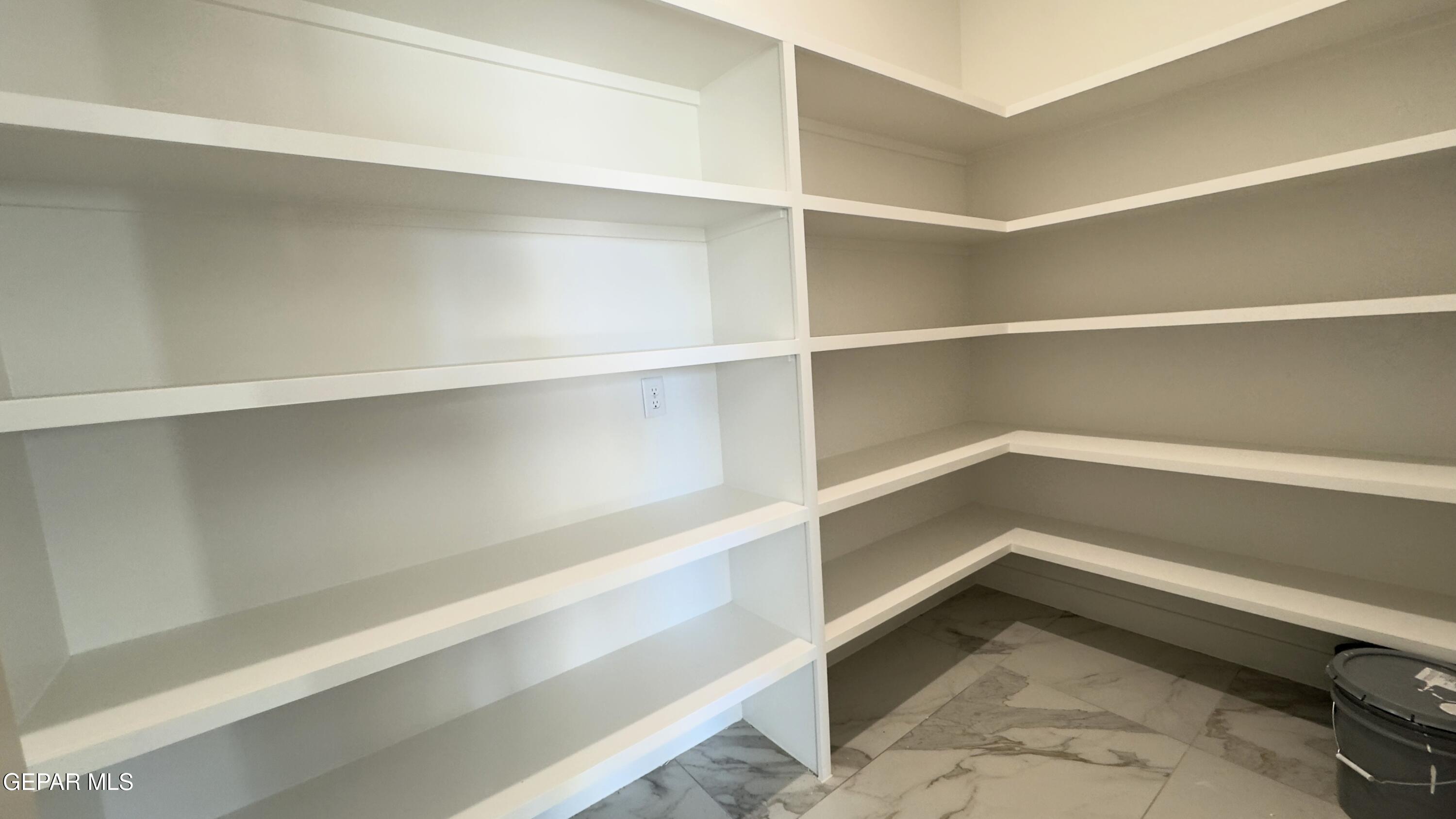 5656 Rio Bonito Circle El Paso, TX 79932 - Photo 15 of 36 a view of a room with shelf