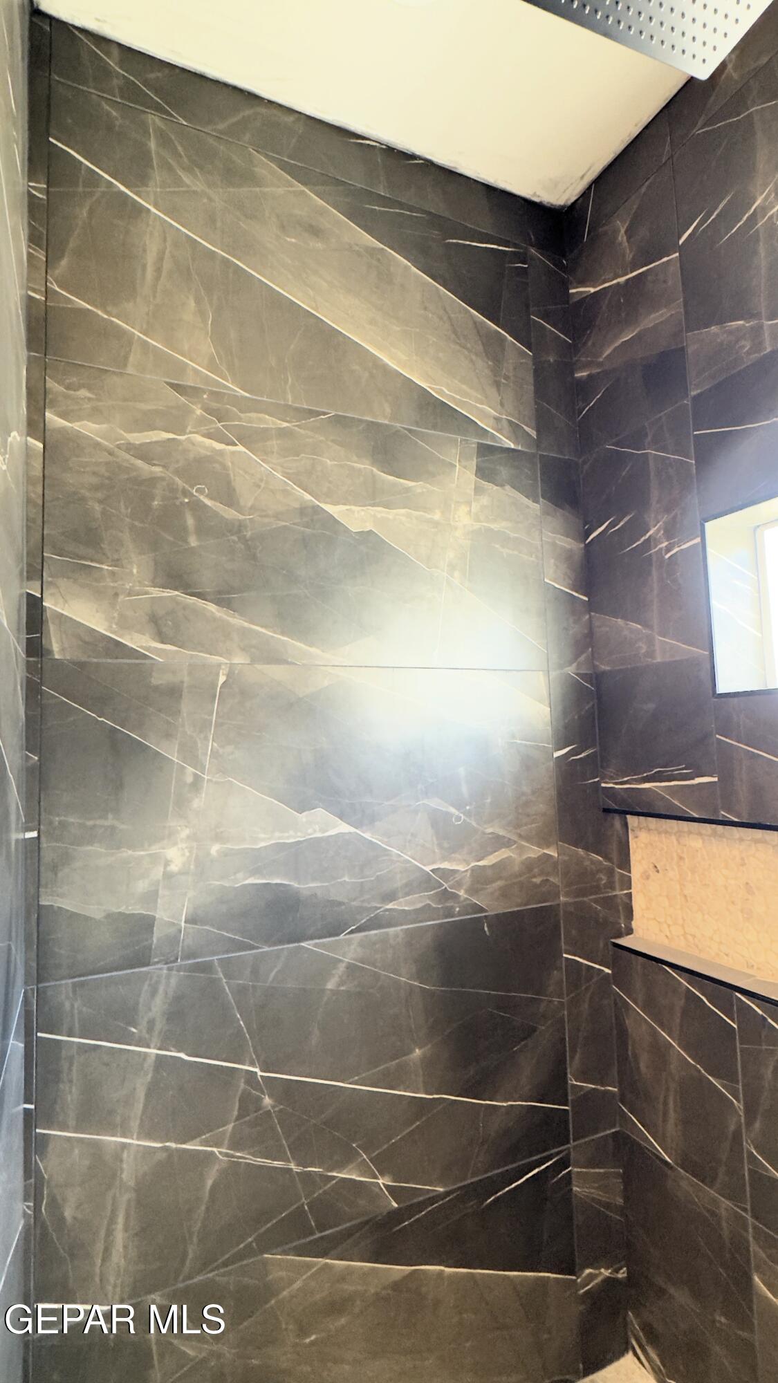 5656 Rio Bonito Circle El Paso, TX 79932 - Photo 17 of 36 a bathroom with a shower