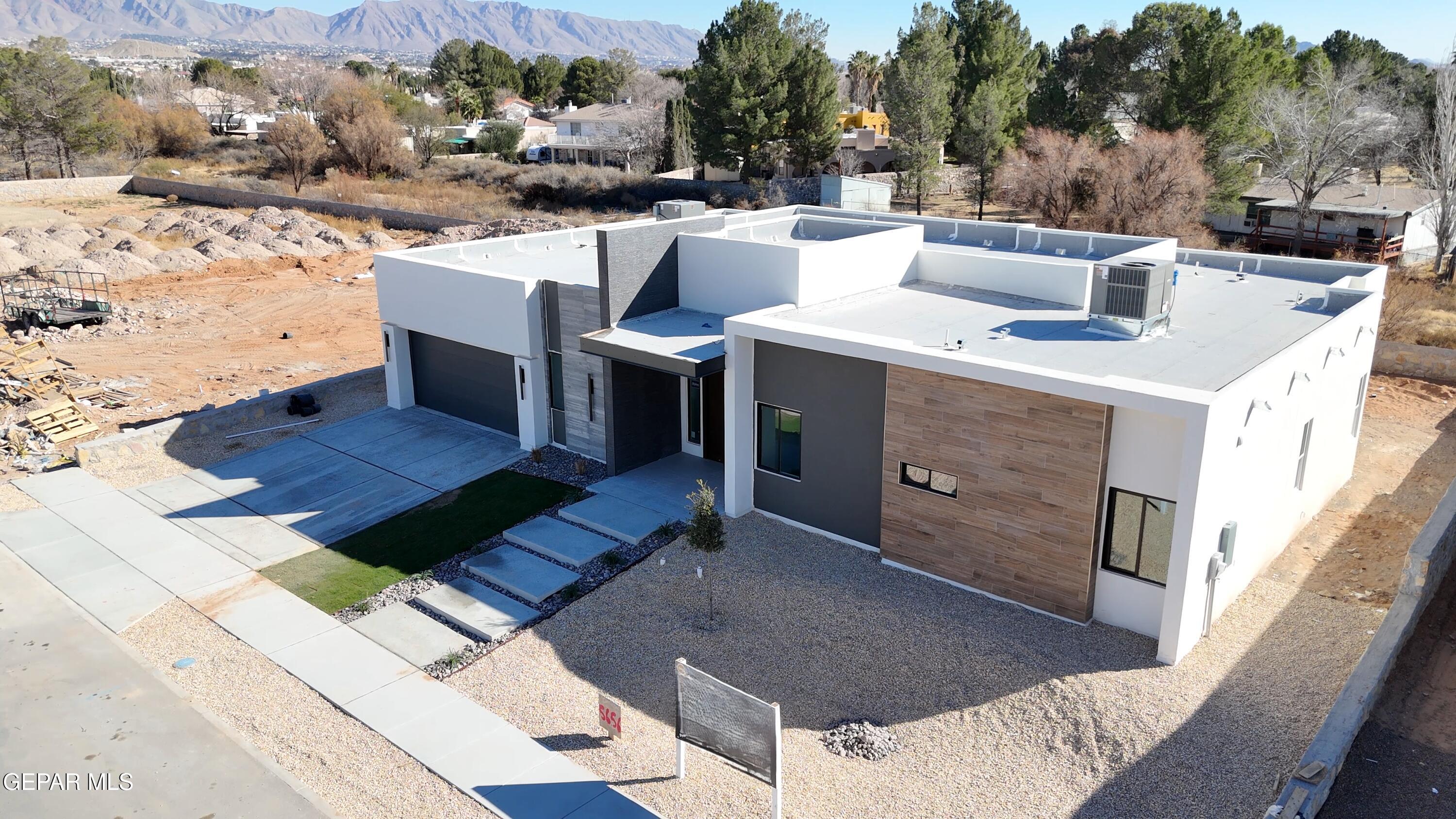 5656 Rio Bonito Circle El Paso, TX 79932 - Photo 2 of 36 a view of a patio with table and chairs