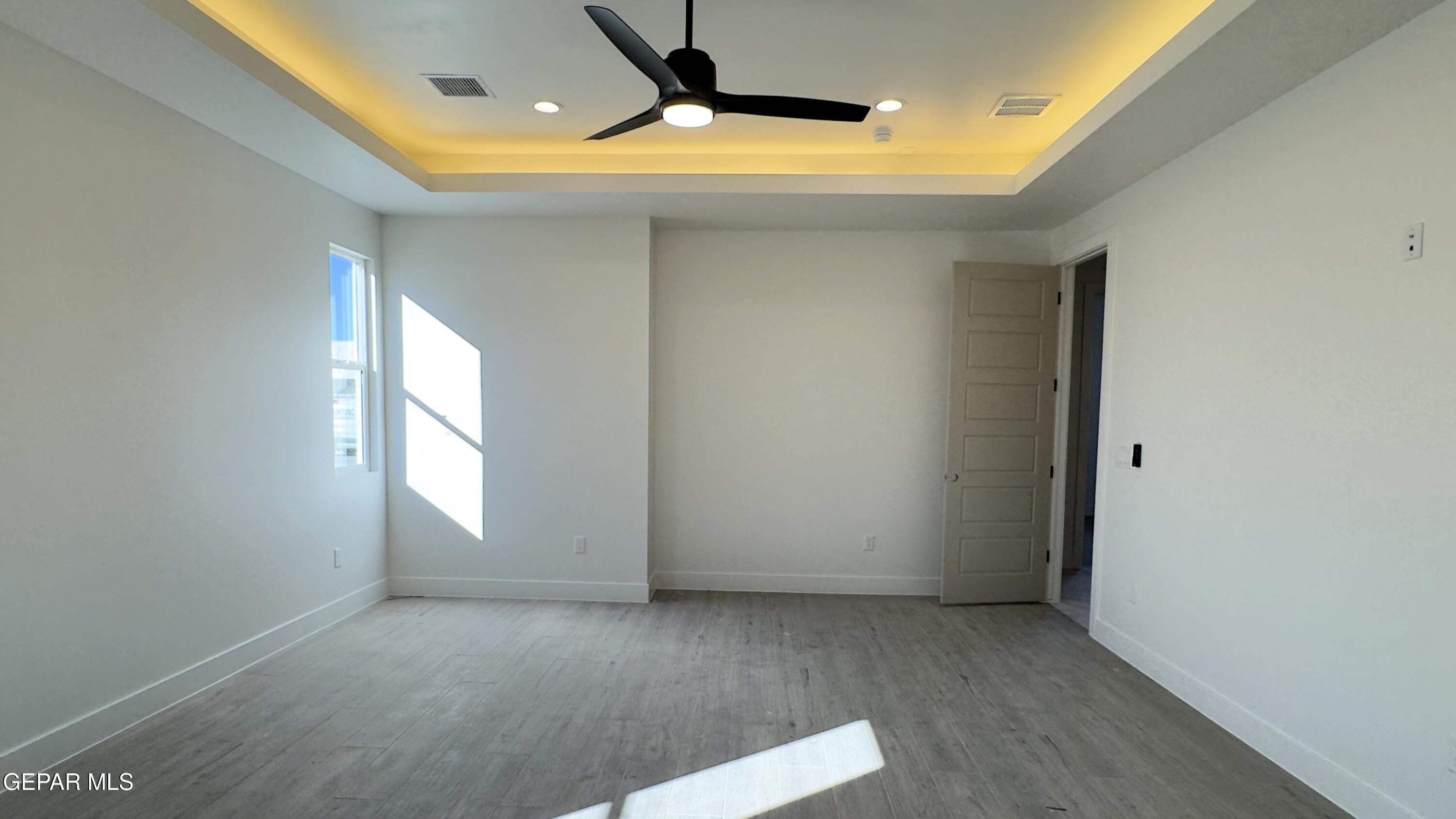 5656 Rio Bonito Circle El Paso, TX 79932 - Photo 24 of 36 a view of empty room with windows