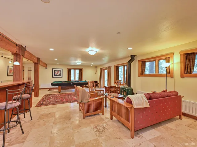 a view of a hallway with a furniture and a livingroom view