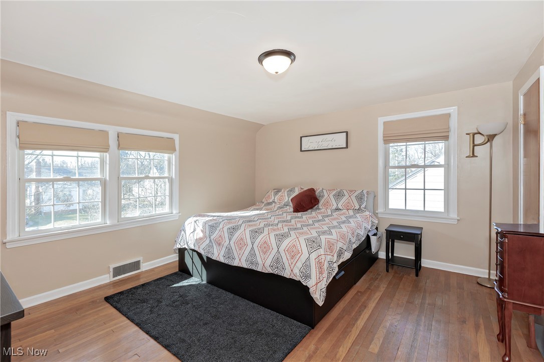 5263 Edenhurst Road Cleveland, OH 44124 - Photo 20 of 38 Natural light at every turn, hardwood floors in the primary bedroom.