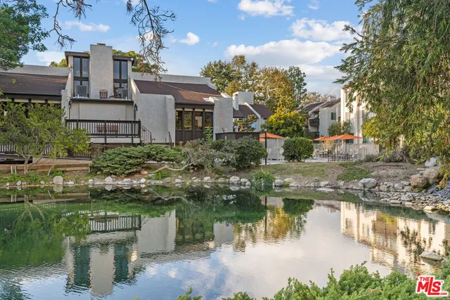 a view of a house with a lake view
