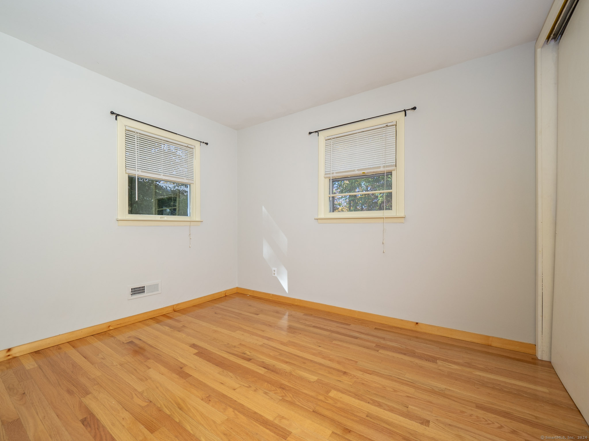 27 Woodland Way Ridgefield, CT 06877 - Photo 11 of 18 a view of empty room with wooden floor