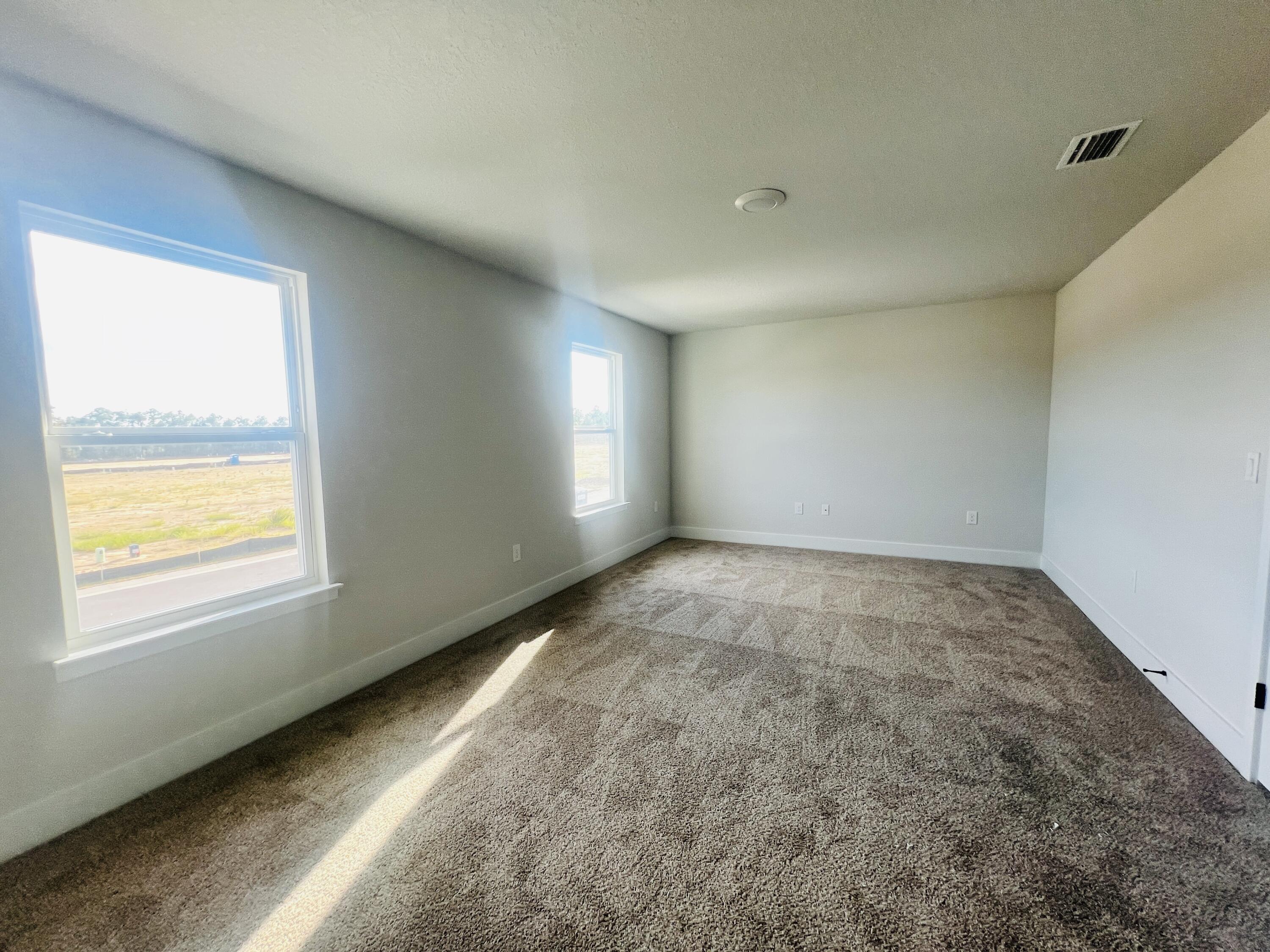 5303 Hidden Pines Circle Milton, FL 32583 - Photo 14 of 22 a view of an empty room and window
