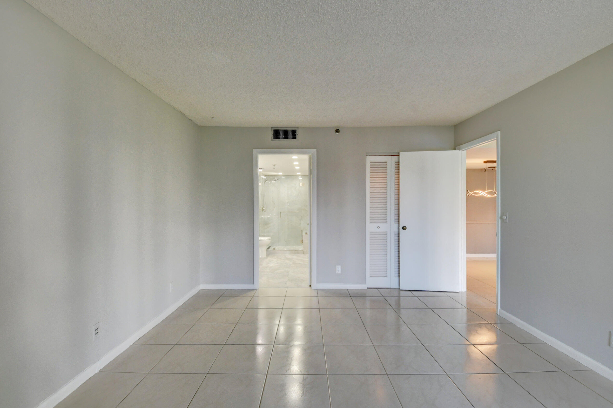 6500 Northwest 2nd Avenue, Unit 111 Boca Raton, FL 33487 - Photo 12 of 23 Master Bedroom