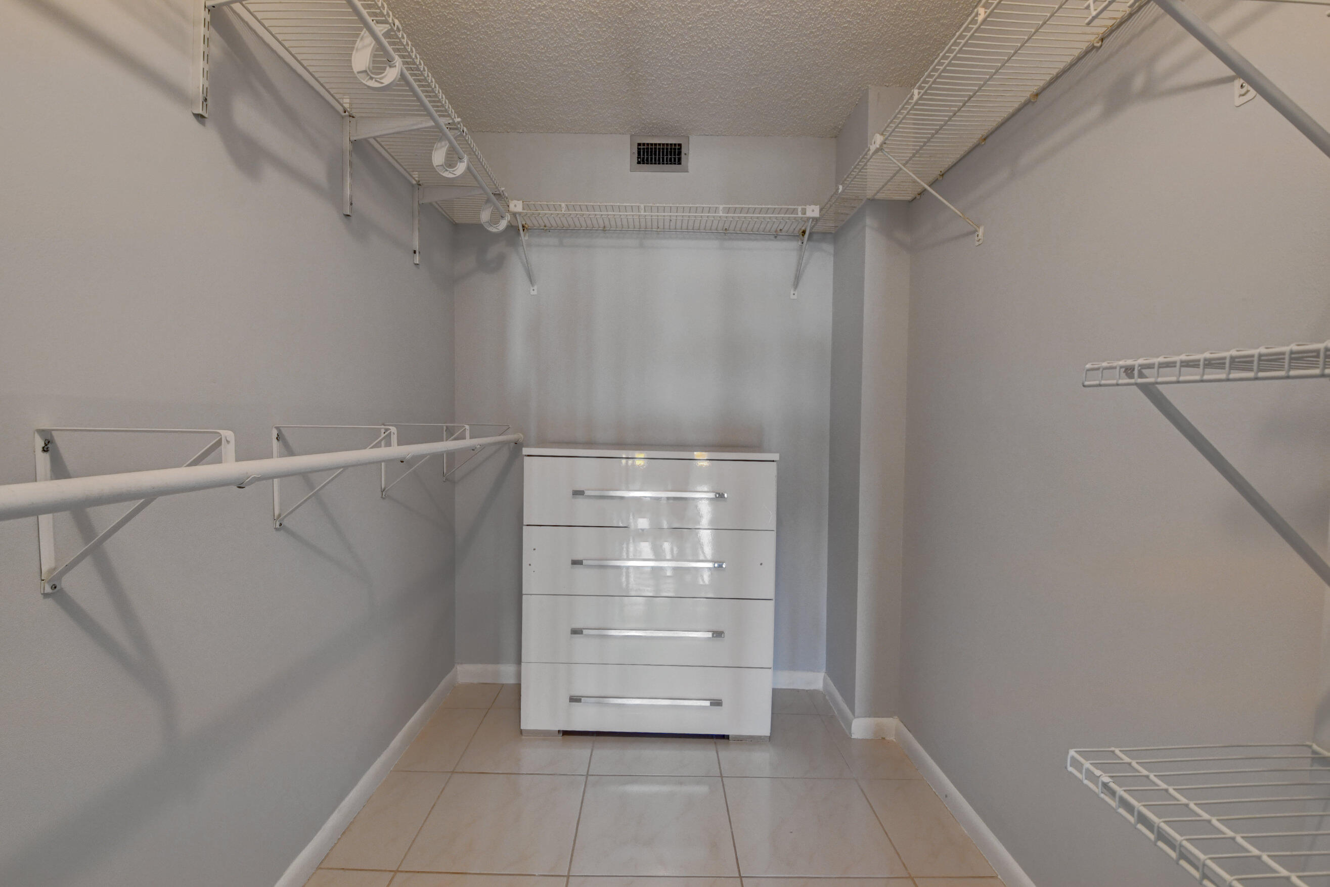 6500 Northwest 2nd Avenue, Unit 111 Boca Raton, FL 33487 - Photo 13 of 23 Walk-In Closet