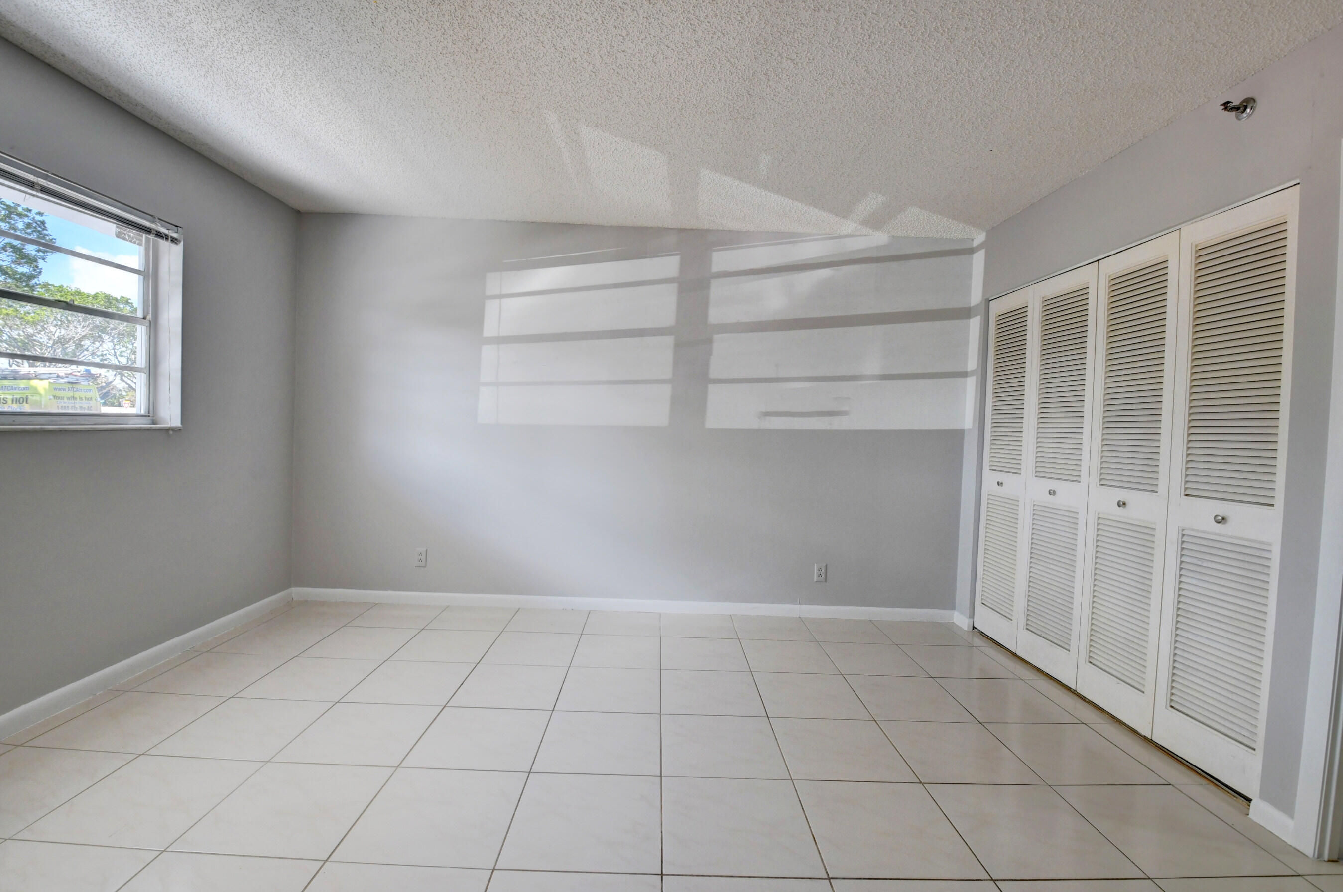 6500 Northwest 2nd Avenue, Unit 111 Boca Raton, FL 33487 - Photo 14 of 23 Guest Bedroom