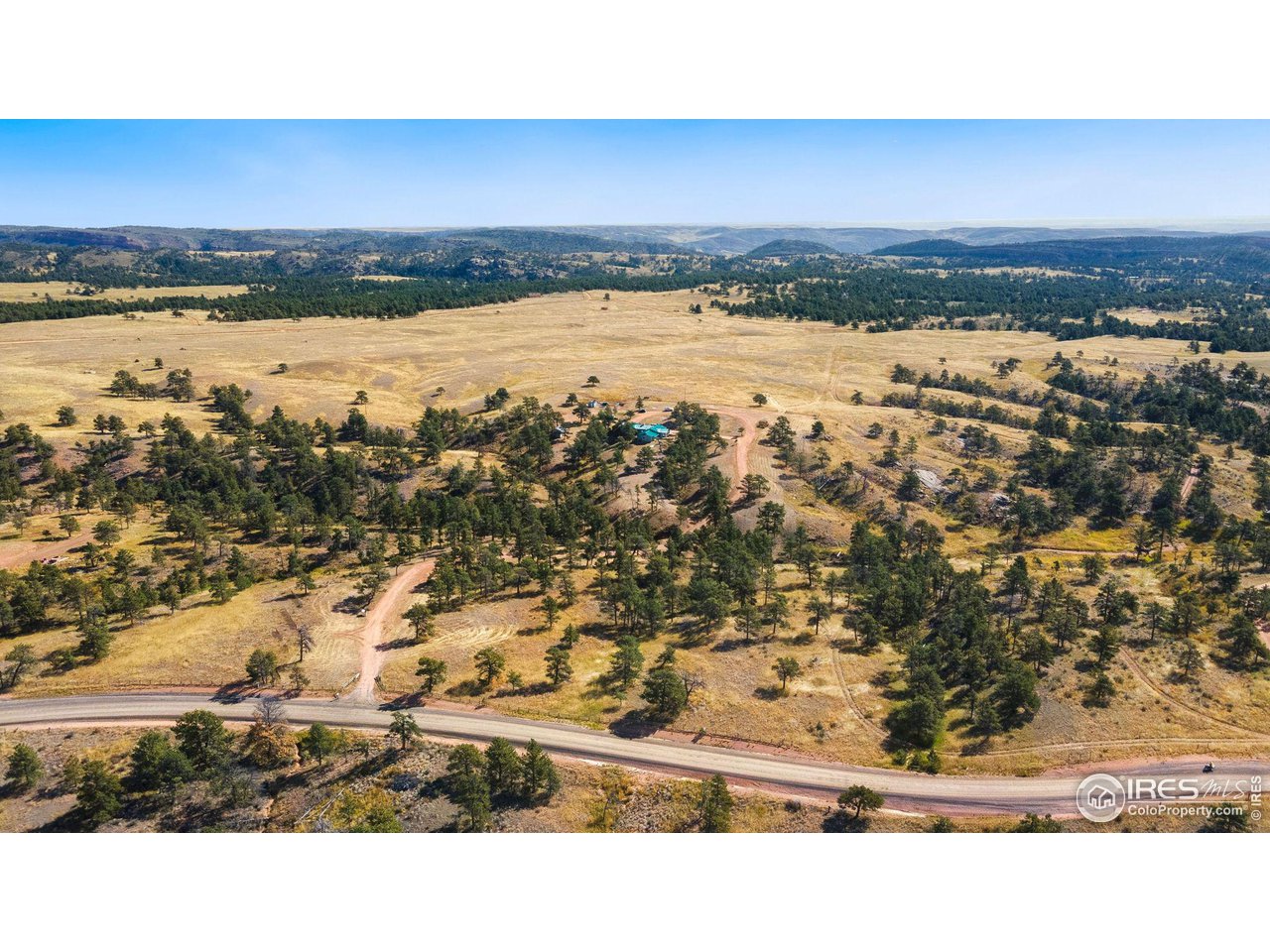 7770 Red Mountain Road Livermore, CO 80536 - Photo 30 of 36 a view of lake and mountain
