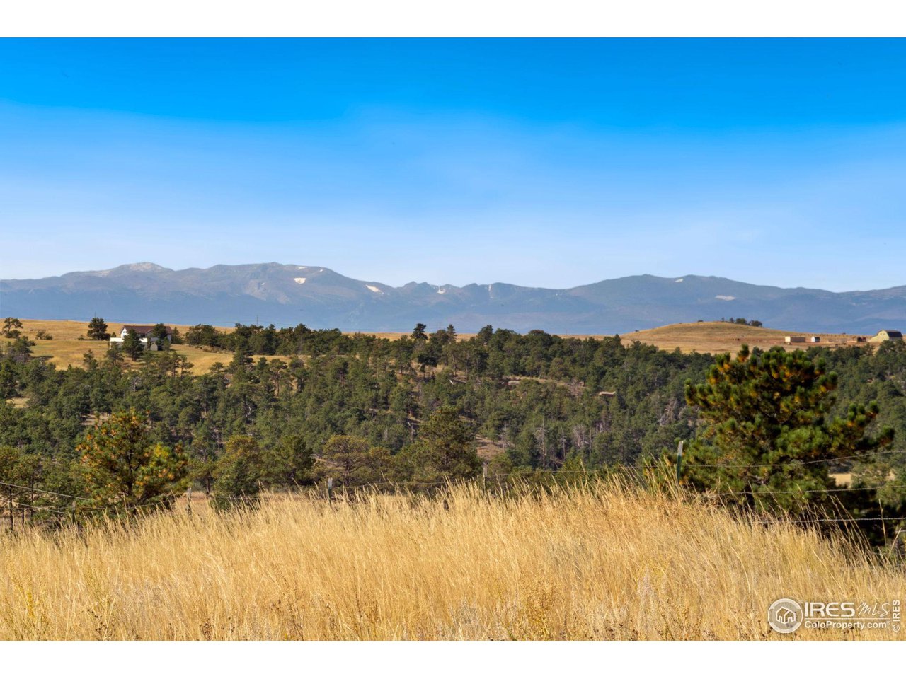 7770 Red Mountain Road Livermore, CO 80536 - Photo 36 of 36 a view of mountain with sunset in background