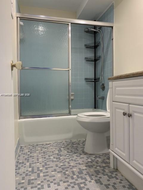 632 Northwest 13th Street, Unit 230 Boca Raton, FL 33486 - Photo 5 of 12 a bathroom with a toilet and a shower