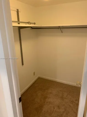 a view of small space with racks on the wall