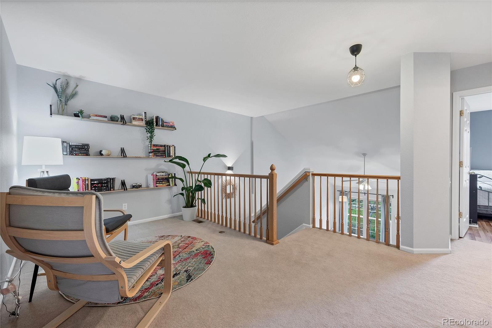 893 South Evanston Circle Aurora, CO 80012 - Photo 16 of 28 a living room with furniture