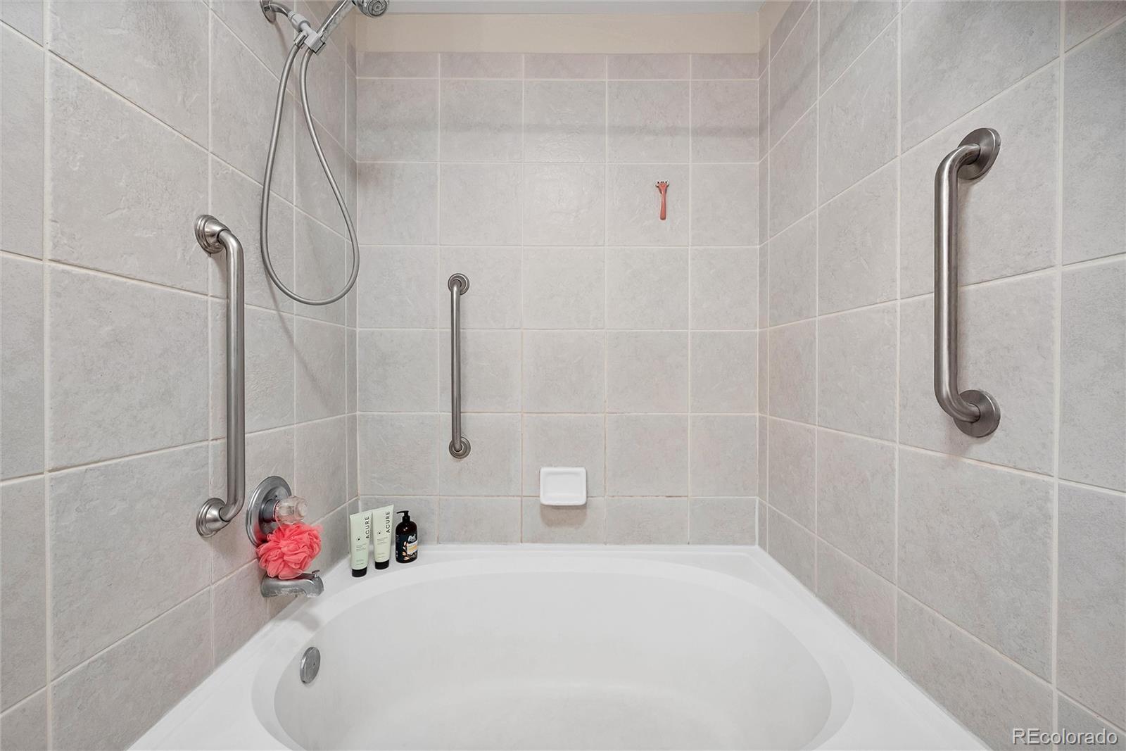 893 South Evanston Circle Aurora, CO 80012 - Photo 21 of 28 a bathroom with a shower