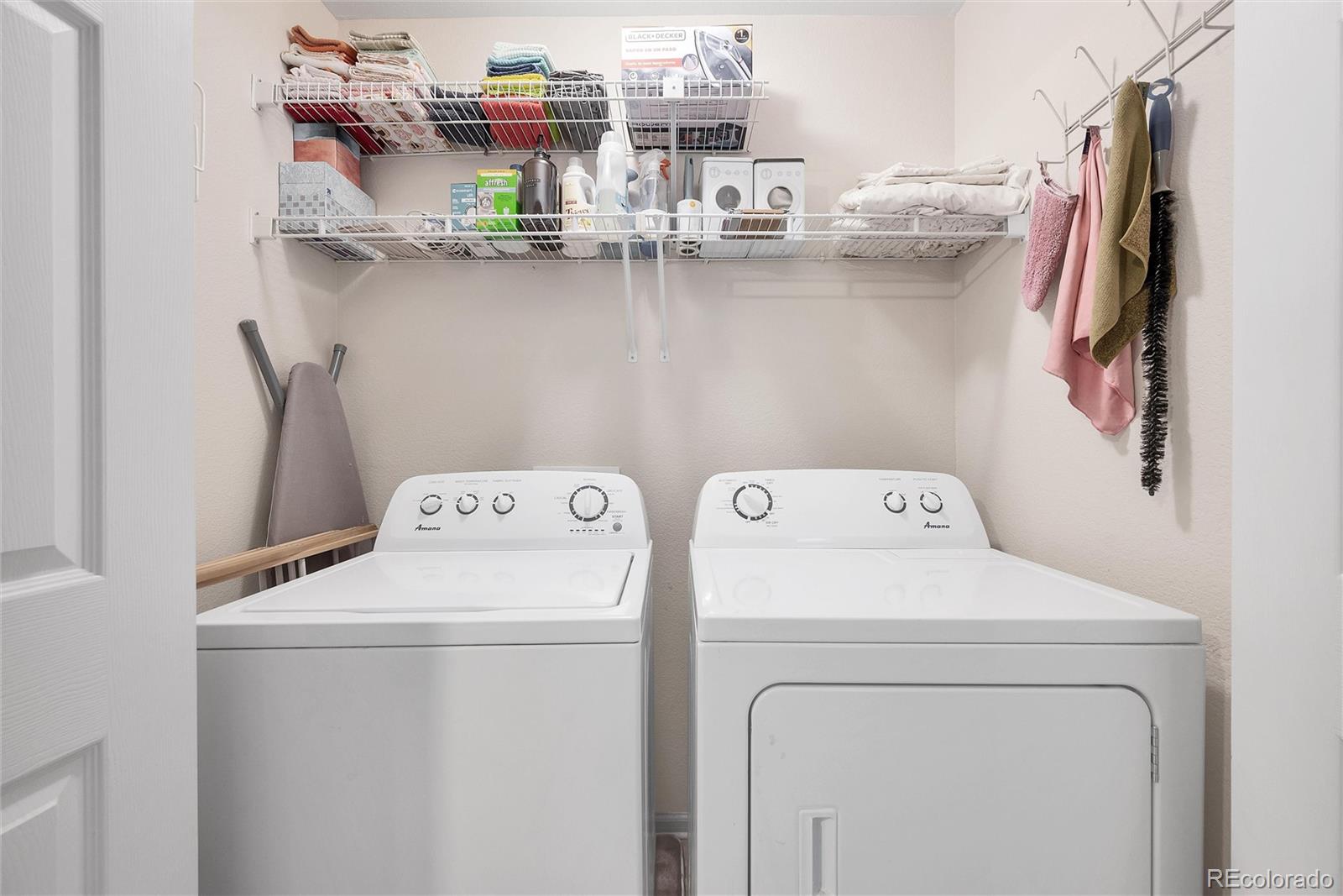 893 South Evanston Circle Aurora, CO 80012 - Photo 24 of 28 a utility room with dryer and washer