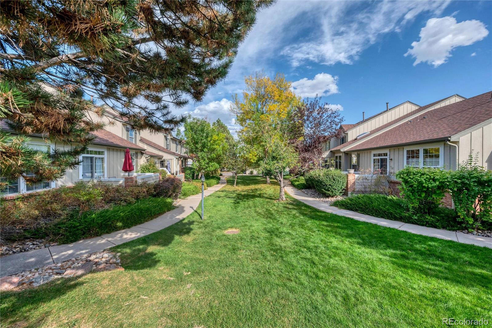 893 South Evanston Circle Aurora, CO 80012 - Photo 27 of 28 a house view with a garden space