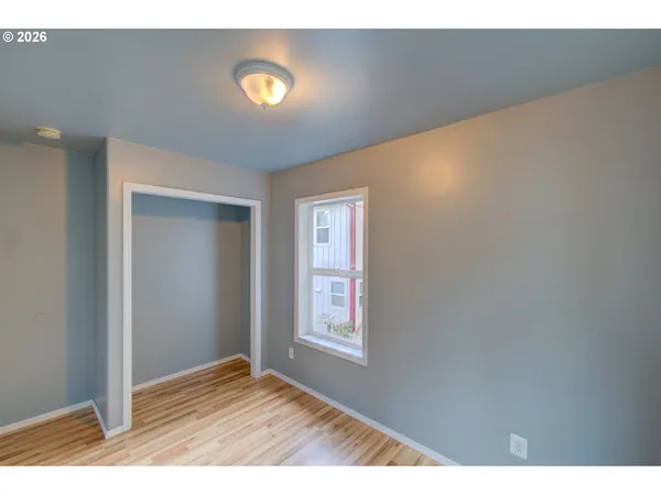 a view of an empty room and window