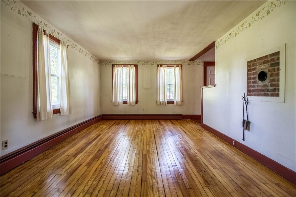 1090 Maplewood Road Newfield, ME 04095 - Photo 16 of 27 Living room w/ refinished hardwood...