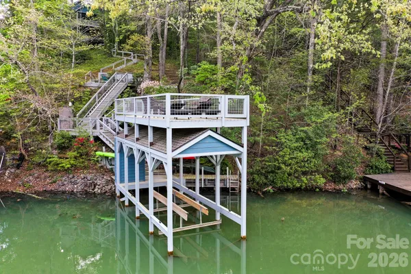 a house with river in front of it