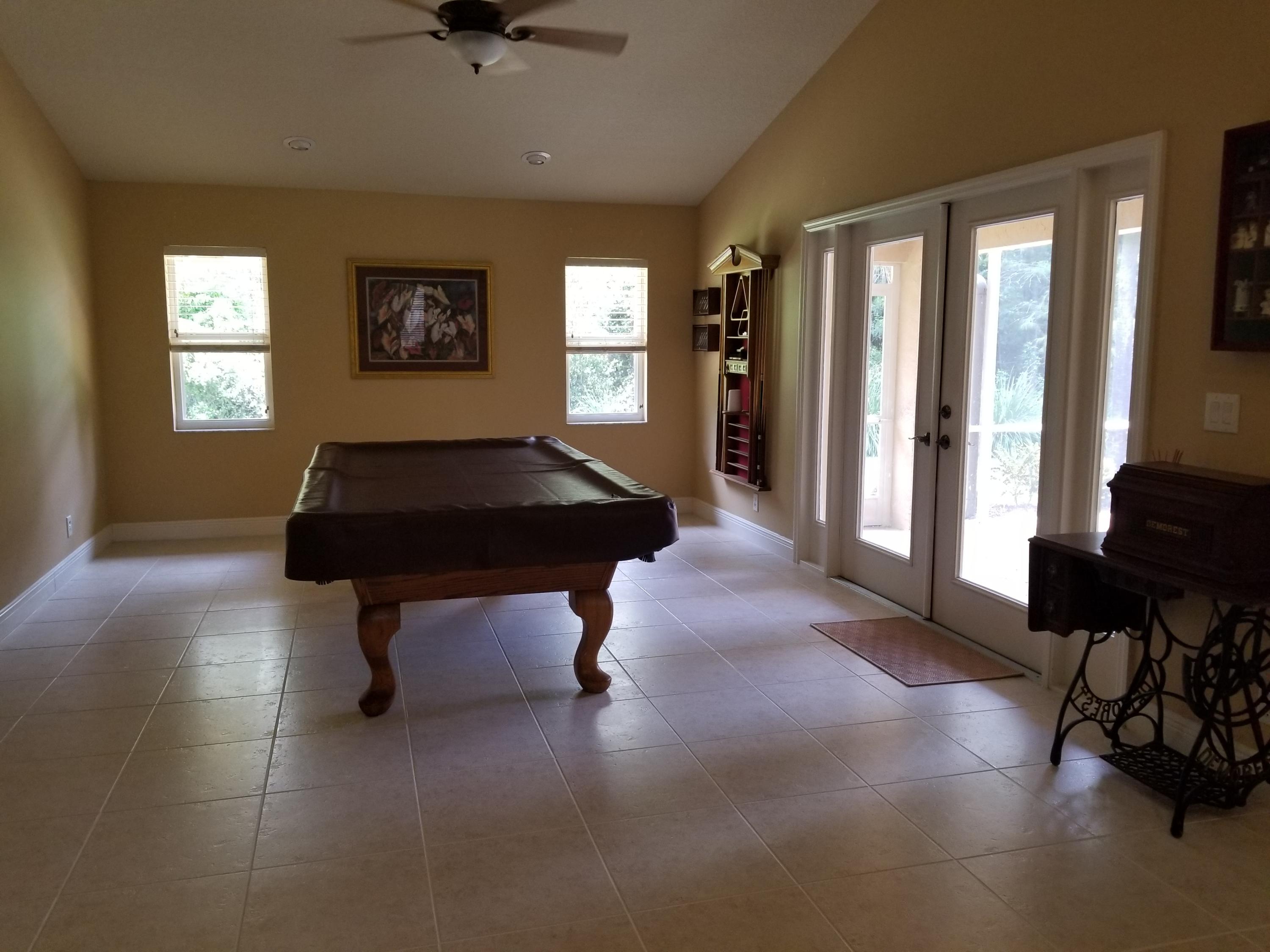 6037 Reynolds Road Lake Worth, FL 33449 - Photo 19 of 44 FAMILY ROOM