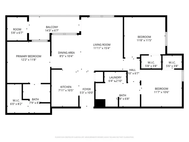 a front view of house with yard slide and large tree