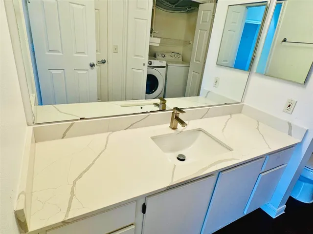 an empty room with a empty space and windows